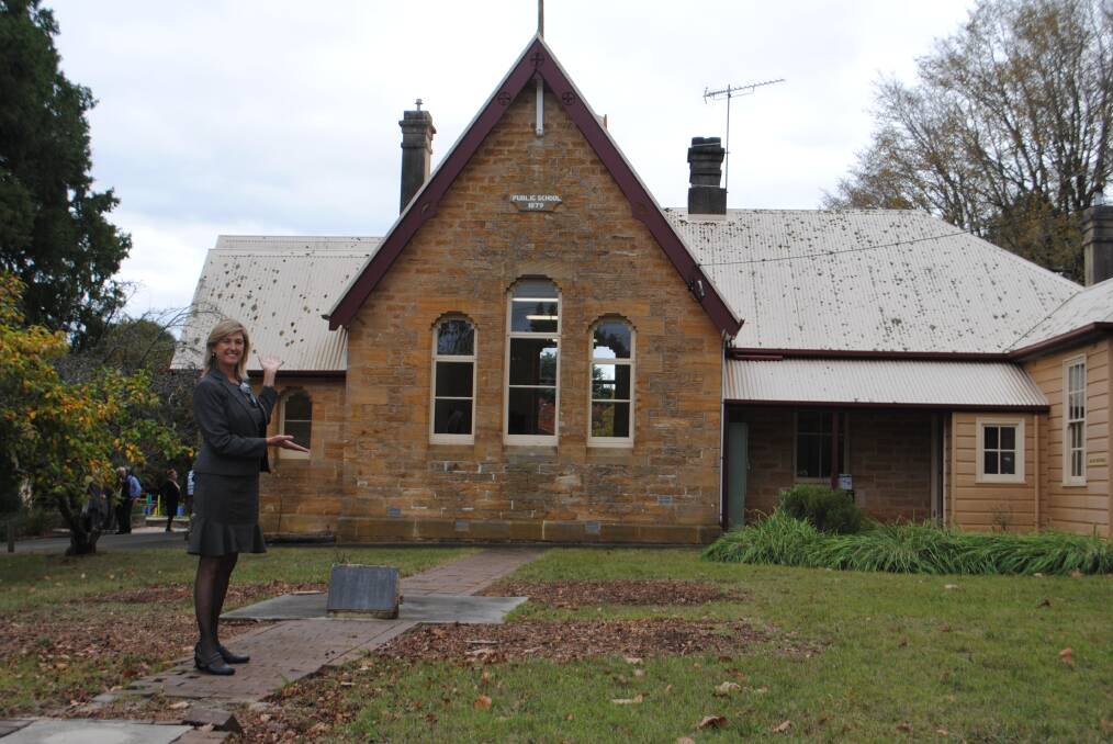 Ray White Bowral real estate agent Lynda Sutherland in front of Sutton Forest Public School.     Photo by Emily Bennett