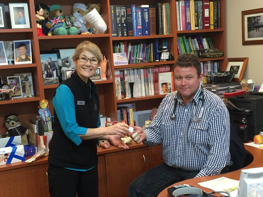 Dr Geoffery Sparkes getting his blood pressure checked by practice nurse Lisa Kume at the Southern Medical Centre. Photo: supplied