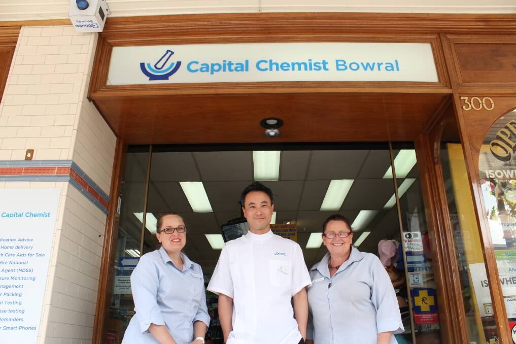 Rebecca-Jo Costelloe, Dickson Yan and Wendy Moss outside Capital Chemist Bowral. Photo by Megan Drapalski