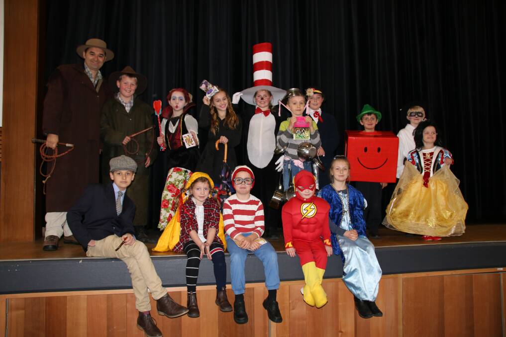 Southern Highlands Christian School principal Andrew Middleton with some of the primary school's best dressed book characters.