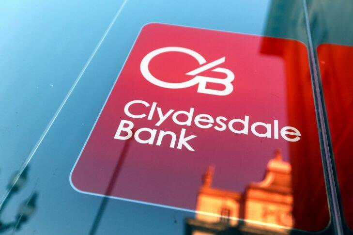A sign hangs in the window of a branch of Clydesdale Bank Plc, owned and operated by National Australia Bank Ltd., in London, U.K., on Tuesday, Jan. 19, 2016. National Australia Bank Ltd. set an initial public offering price range for CYBG Plc, its U.K. unit -- known to its customers as Clydesdale Bank and Yorkshire Bank -- that values CYBG at as much as 2.07 billion pounds ($2.95 billion) and advances its plan to exit the market. Photographer: Chris Ratcliffe/Bloomberg