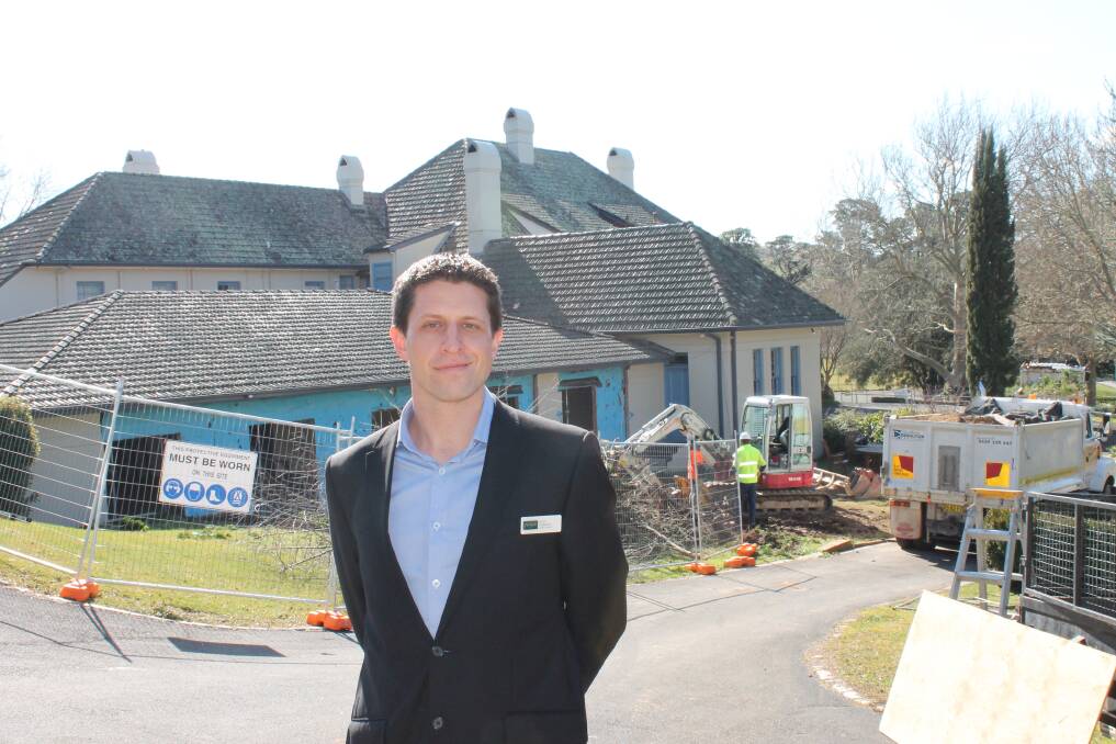Peppers Manor House General Manager Jesse Kornoff, in front of the renovations.  
Photo by Jen Walker