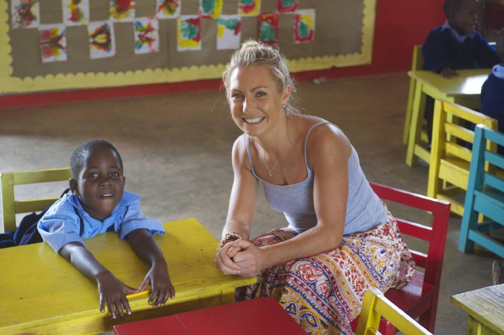 Annabelle Chauncy with a student at Katuuso School in Uganda. Photo supplied