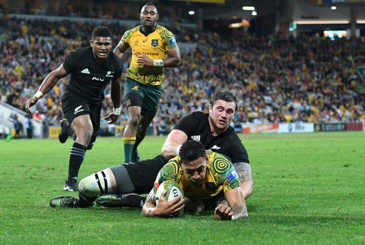 Israel Folau of the Wallabies scores a try during the third Bledisloe Cup match between the Australian Wallabies and the New Zealand All Blacks at Suncorp Stadium in Brisbane, Saturday, October 21, 2017. (AAP Image/Dan Peled) NO ARCHIVING, EDITORIAL USE ONLY