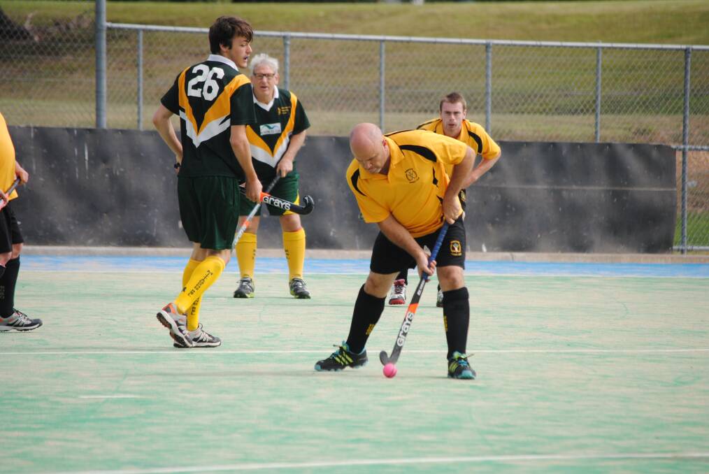 LEFT: Jim Good controls possession for Robertson's third grade side during a hockey match last weekend. 			             
   Photo by Josh  
         Bartlett