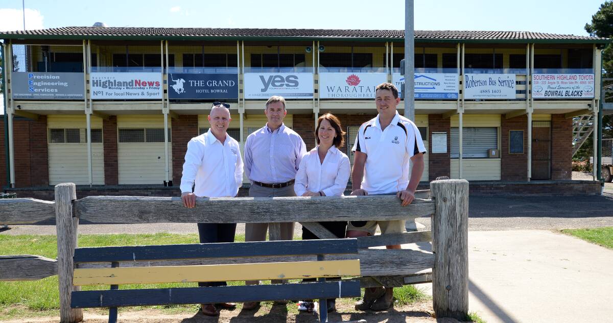 Destination Southern Highlands group manager Steve Rosa, council s parks and open space co-ordinator Peter Byrne, council s capital works project officer Michelle Green and Bowral Blacks club president Mark Freund joined together last October to celebrate Bowral securing the 2015 NSW Country Championships. 				            													                    Photo by Roy Truscott