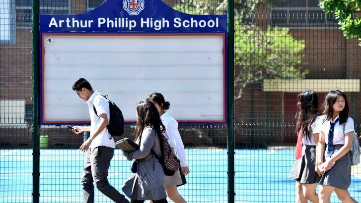 Students from Arthur Phillip High School in Parramatta leaving school on Tuesday.
 Photo: Steven Siewert