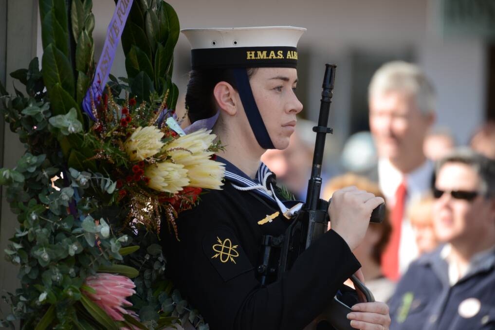 A seaman from HMAS Albatross stands guard at the Mittagong cenotaph. Photo by Roy Truscott