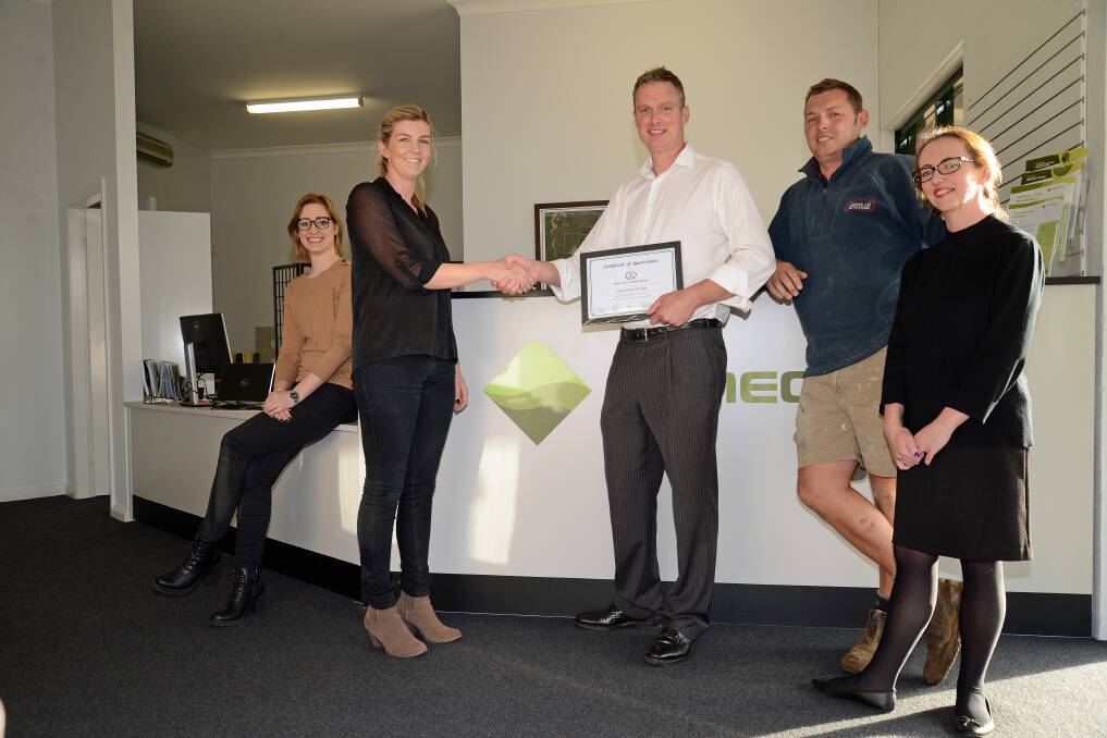 David Kent, Troy Brown and Hayley Rennie present Sam Rocchi and Claudia Farrar from Hume Coal with a certificate of thanks.