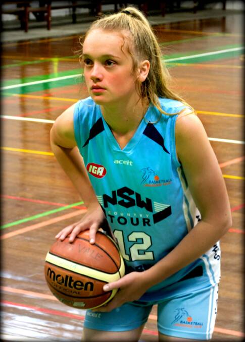 Phoebe Johnson prepares to take a free throw during a basketball game last year. Photo supplied