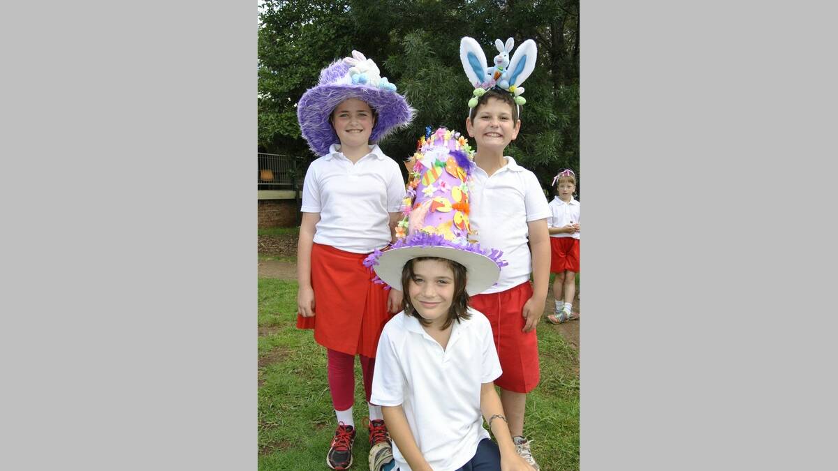 Isobel DeNooy, Isaac Douglas and Reggie Baker with their Easter hats.  Photo by Emma Biscoe