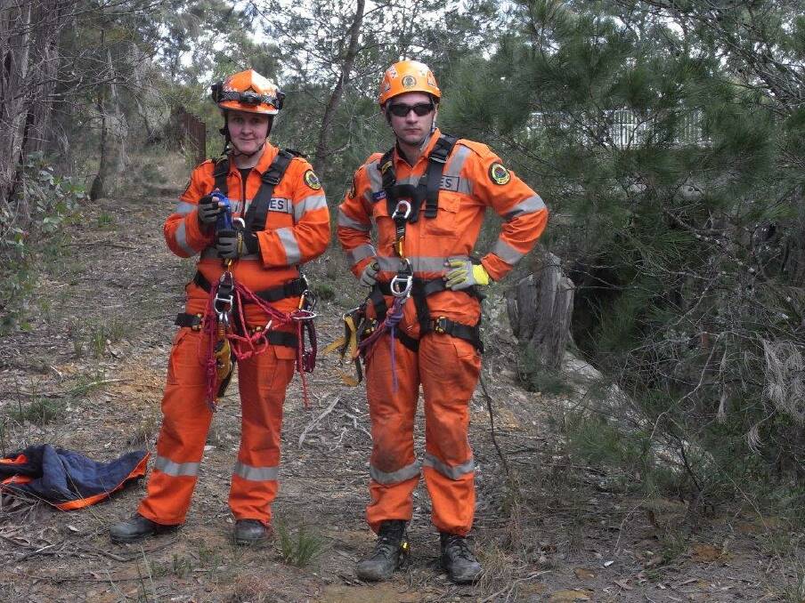 SES volunteers Carly Miller and Matt Price prepare to take part in vertical rescue training recently. Photo: Leonie Knapman