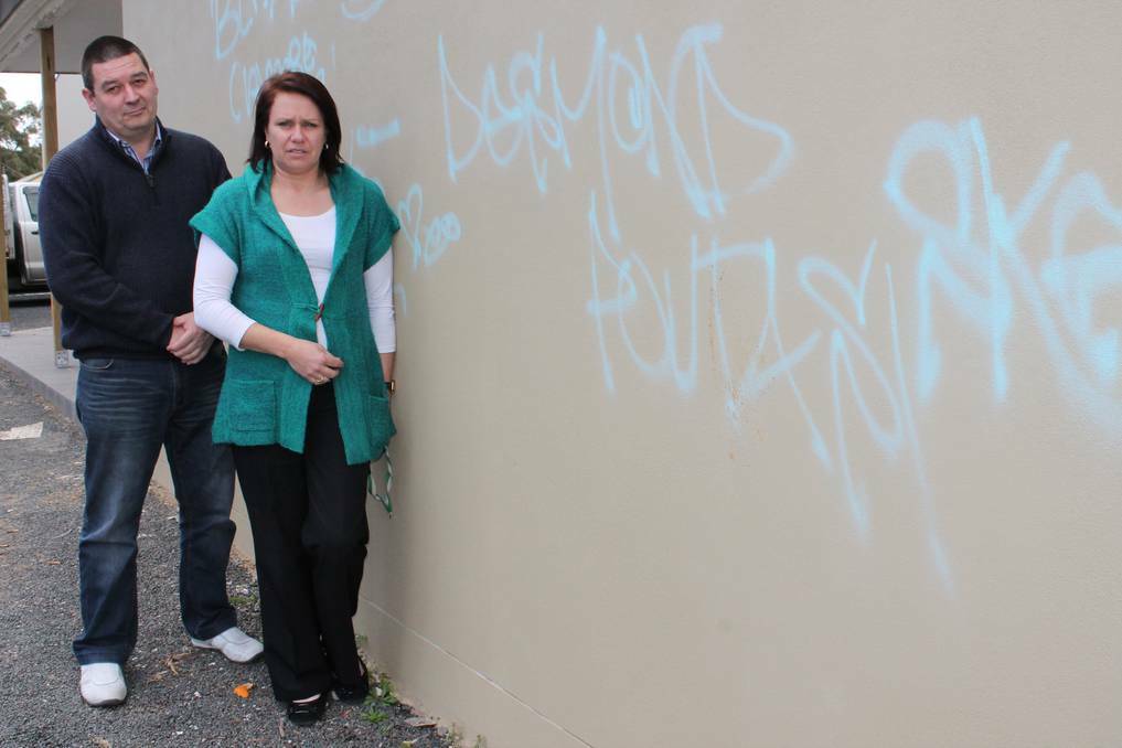 Rick Davies and Sandra Mitchell are devastated by the senseless graffiti at Moss Vale Basketball Stadium. Photo by Jen Walker