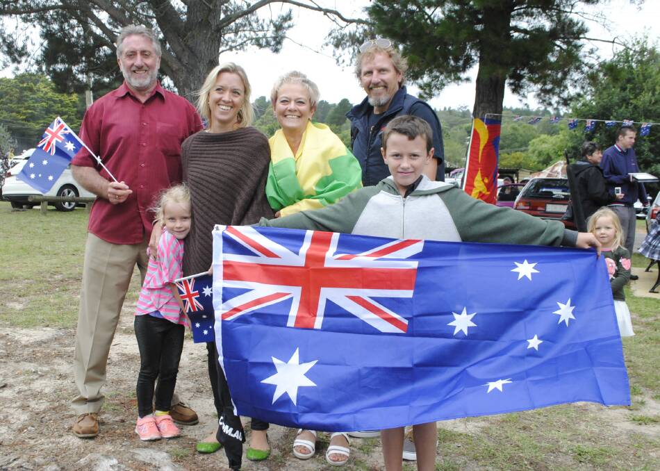Mittagong resident George Hyland, Phoebe (5) and Sally Brauer from Sydney, Mittagong residents Allison Hyland, Scott Armstrong and 11 year old Jackson Armstrong Hyland at  the 2015 Wingecarribee Shire's Australia Day ceremony in Berrima. Photo by Emma Biscoe