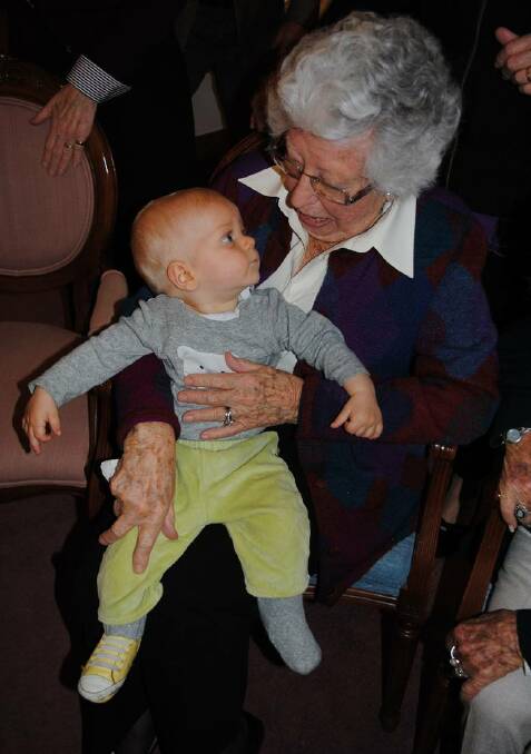 Beryl Morrissey, on her 100th birthday, with great-grandson Angus Dowsett (eight months), the youngest member of her family. 