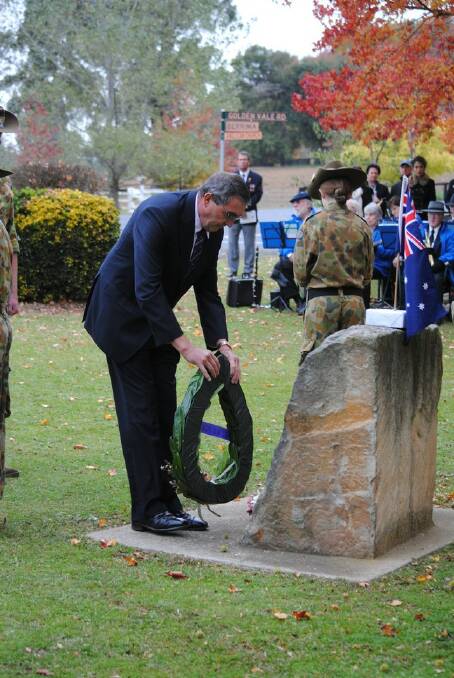 Goulburn MP Pru Gowrad lays a wreath at the Sutton Forest Anzac Service. 