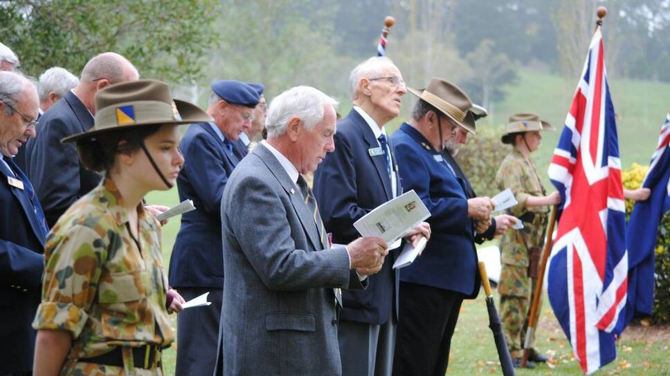 Ex-serviceman line-up to sing the National Anthem at the Sutton Forest Anzac Service. 