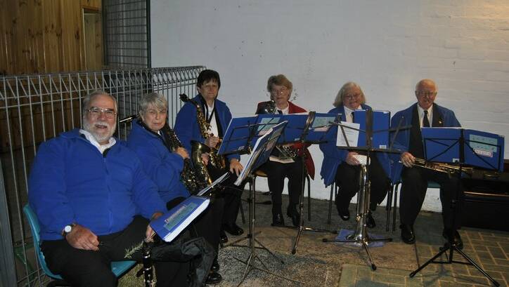 Dennis Purcell, Ann Mawson, Glennis Holton, Fay Craig, Uta Purcell and Ron Holloway from Southern Highlands Community Band. Photo by Dominica Sanda