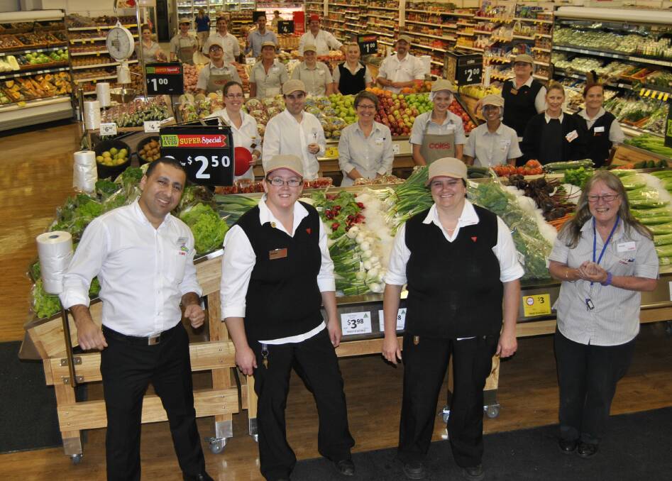 Moss Vale Coles staff, including store manager Charles Antwan (front left), are excited about the official opening on Wednesday.