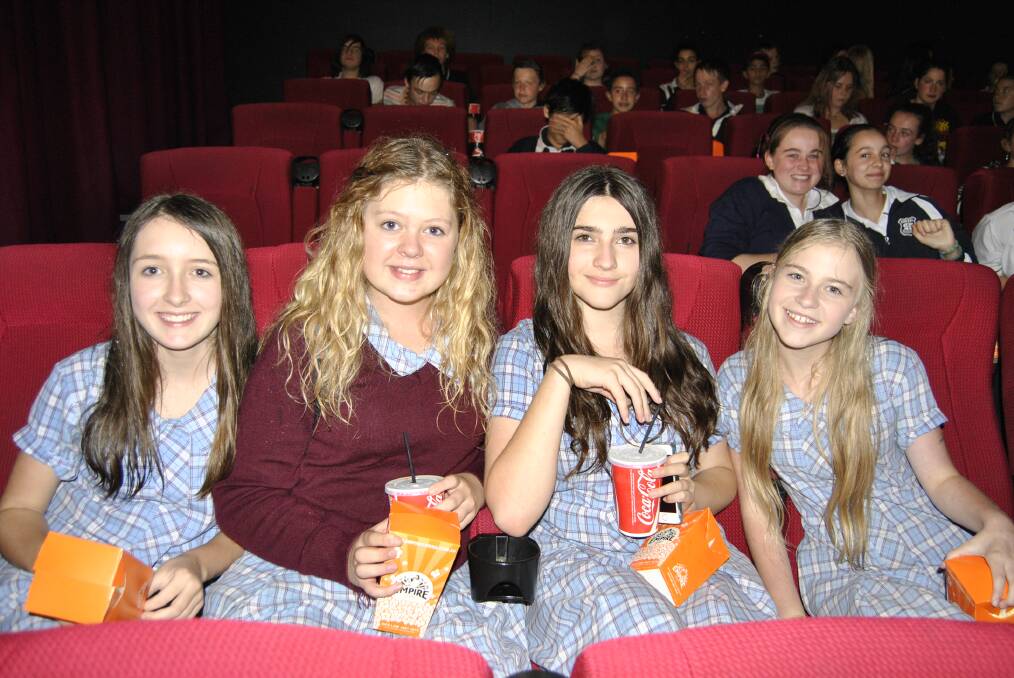 Jade Coom, Grace Beville, Izzy Singh and Taneia Cupitt enjoy the popcorn. Photo by Emma Biscoe