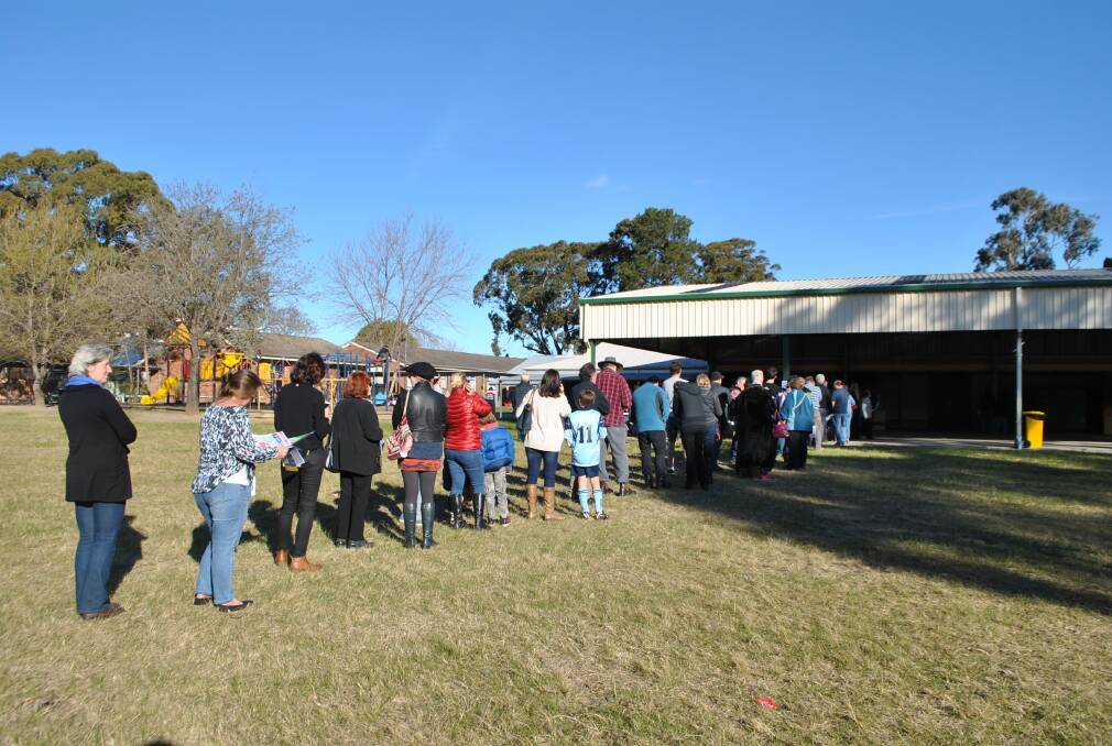 The line at the Mittagong Public School polling centre was still long in the afternoon. Photo by Claire Fenwicke