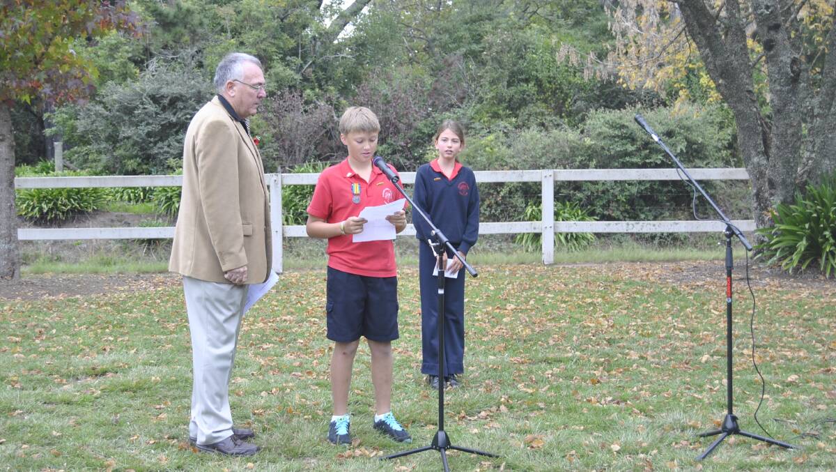 Clayton Deleeuw and Alissa Goodsell from Exeter Public School presenting at the Exeter ANZAC Day service. Photo by Dominica Sanda