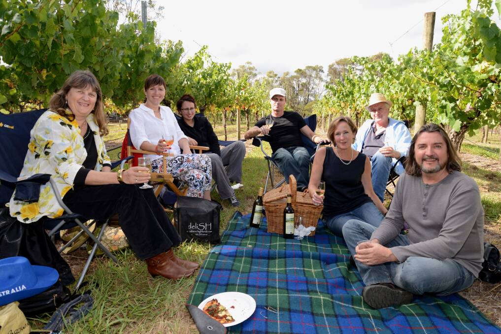 Michele Williams, Michelle Ware, Kimberley Cochrane, Matt Langdon, Geoff and Clare Reinhart and Paul Williams at the Music in the Vines event earlier this year. Music in the Vines is back this weekend on Sunday, April 20. Photo by Roy Truscott