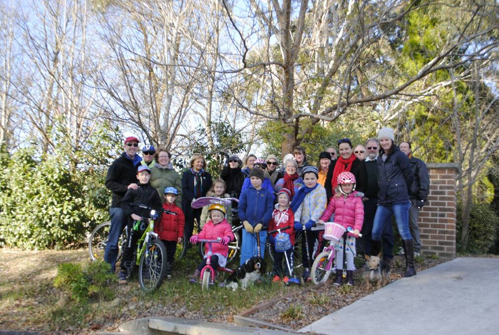Phillip Street residents are geared up with their bikes to use the long-awaited pathway to the Moss Vale to Burradoo cycleway. Photo by Dominica Sanda