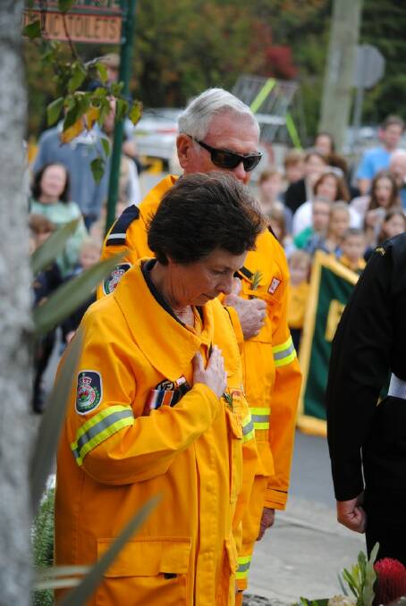 Rural Fire Service volunteers pay their respect at the Bundanoon Memorial Service. 