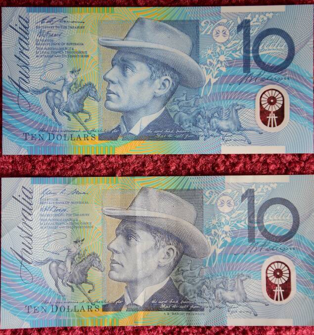 A counterfeit note found in Robertson. The top one is the fake. Key differences are: signatures and words in the top left do not match, the words Banjo AB Patterson are missing from the bottom right. Photo by Roy Truscott
