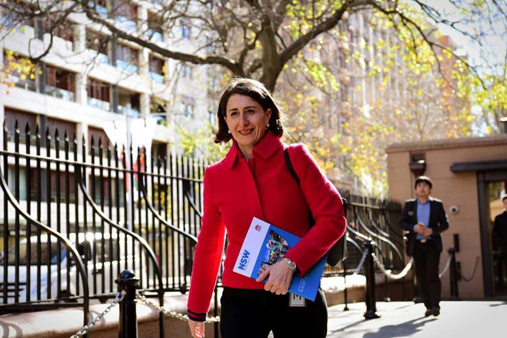NSW State Treasurer Gladys Berejiklian arrives with the 2016/17 budget papers outside State Parliament House. Photo: Wolter Peeters 