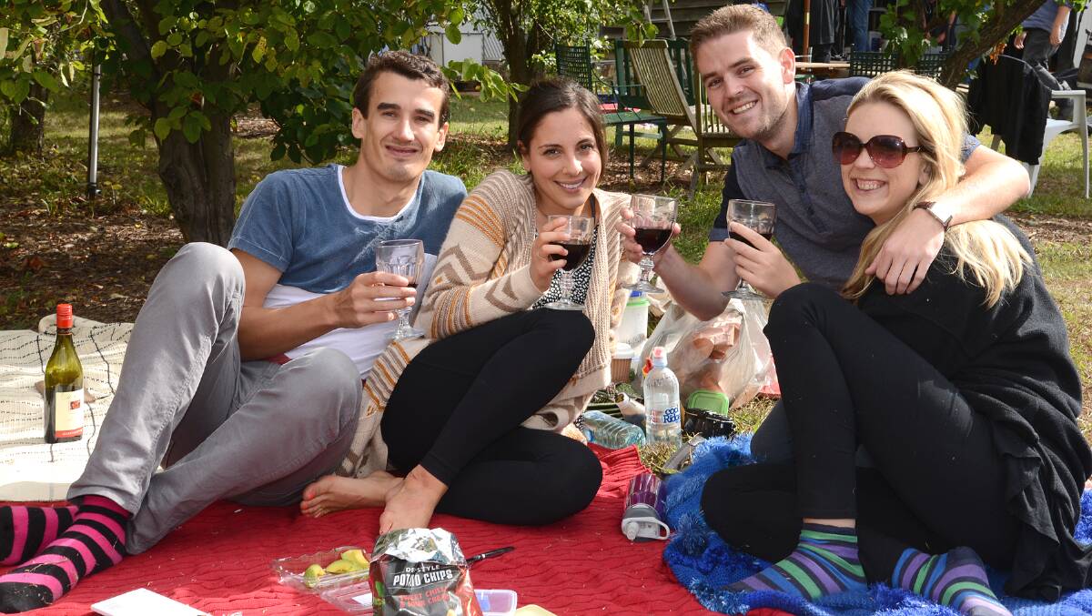 Relaxing with a glass of wine at Joadja were Jon Kaethner, Denise Kara, Rob Gill and Lisa Roadnight at a Music in the Vines event earlier this year. Photo by Roy Truscott