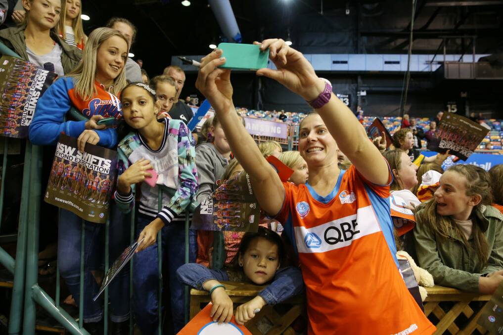 Abbey McCulloch poses for a selfie with NSW Swifts fans after a recent game. Photo: FDC