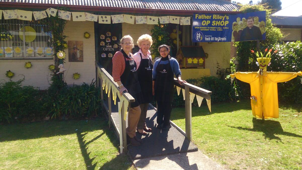 Fr Riley's Youth of the Street Op Shop won this year's Tulip Time Shop Front competition. Pictured are shop volunteers Carolyn Madsen, Kerrin McInerney and Ranne Selvaratnam. Photo by Emma Biscoe