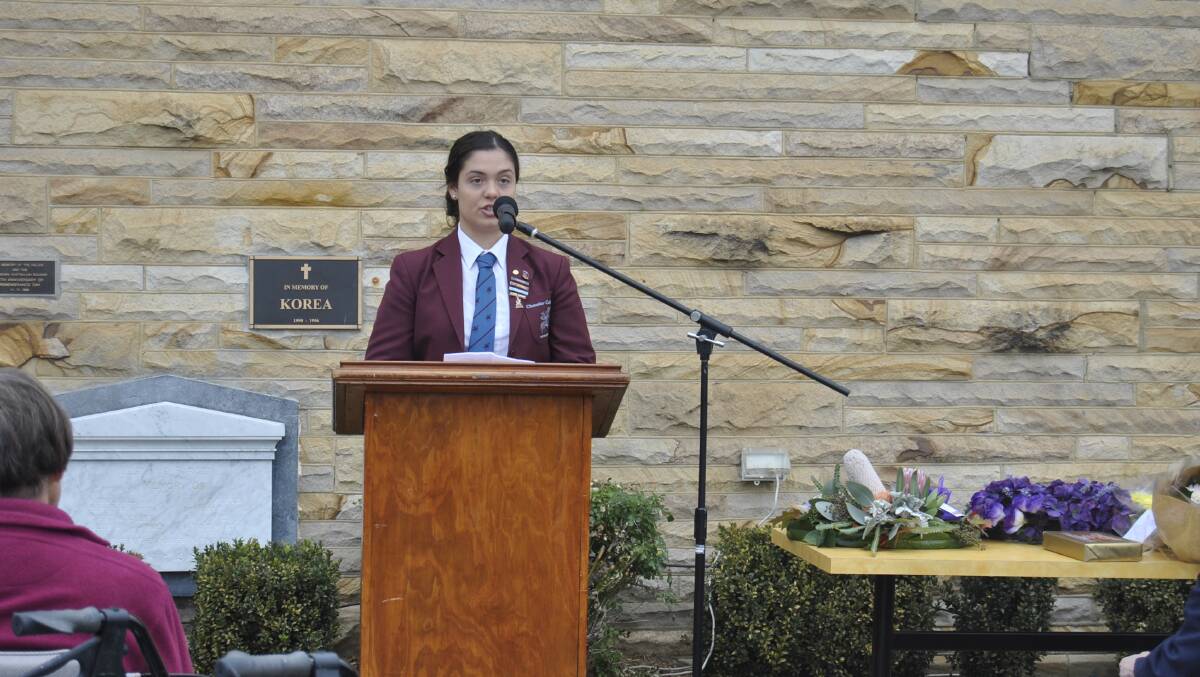 Chevalier College captain Emily Rieber presents an ANZAC address. Photo by Dominica Sanda