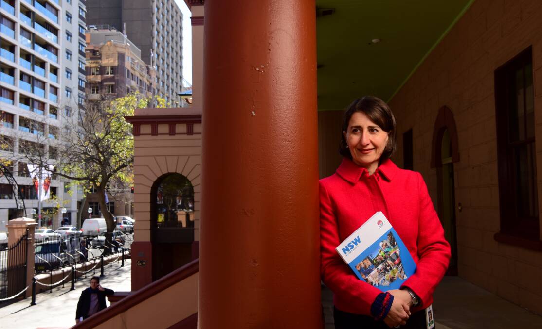 NSW State Treasurer Gladys Berejiklian with the 2016/17 budget papers outside State Parliament House. Photo: Wolter Peeters 