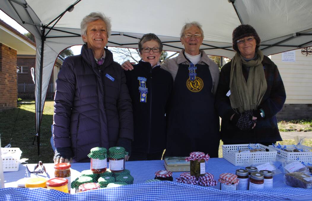 Sue Dale, Jennifer Bowe, Doreen Peace and Margaret Perrine man the Moss Vale ‎CWA‬ cake stall at the town's ‎election‬ booth on Saturday. Photo by Josh Bartlett