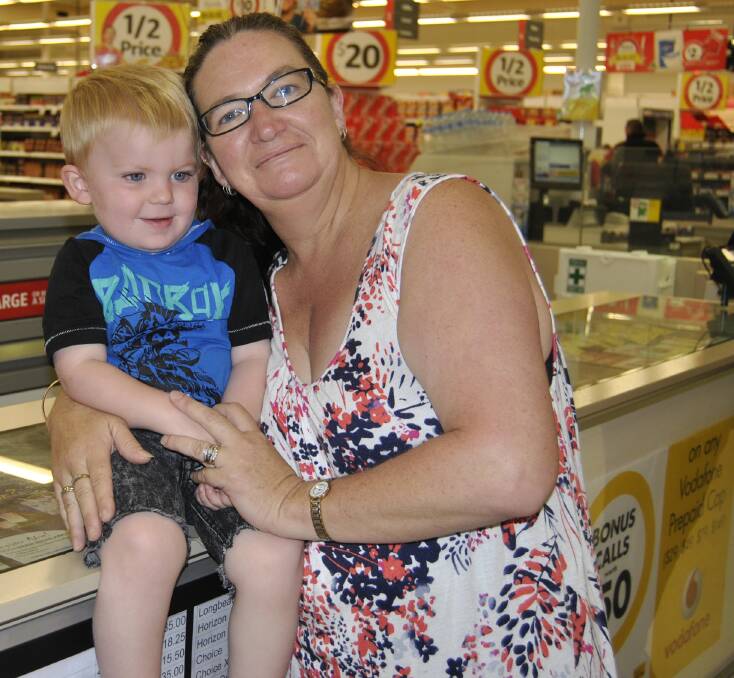 Marlene Phillip and her grandson Jaiden, 2, appreciate the new look of the Moss Vale Coles store.