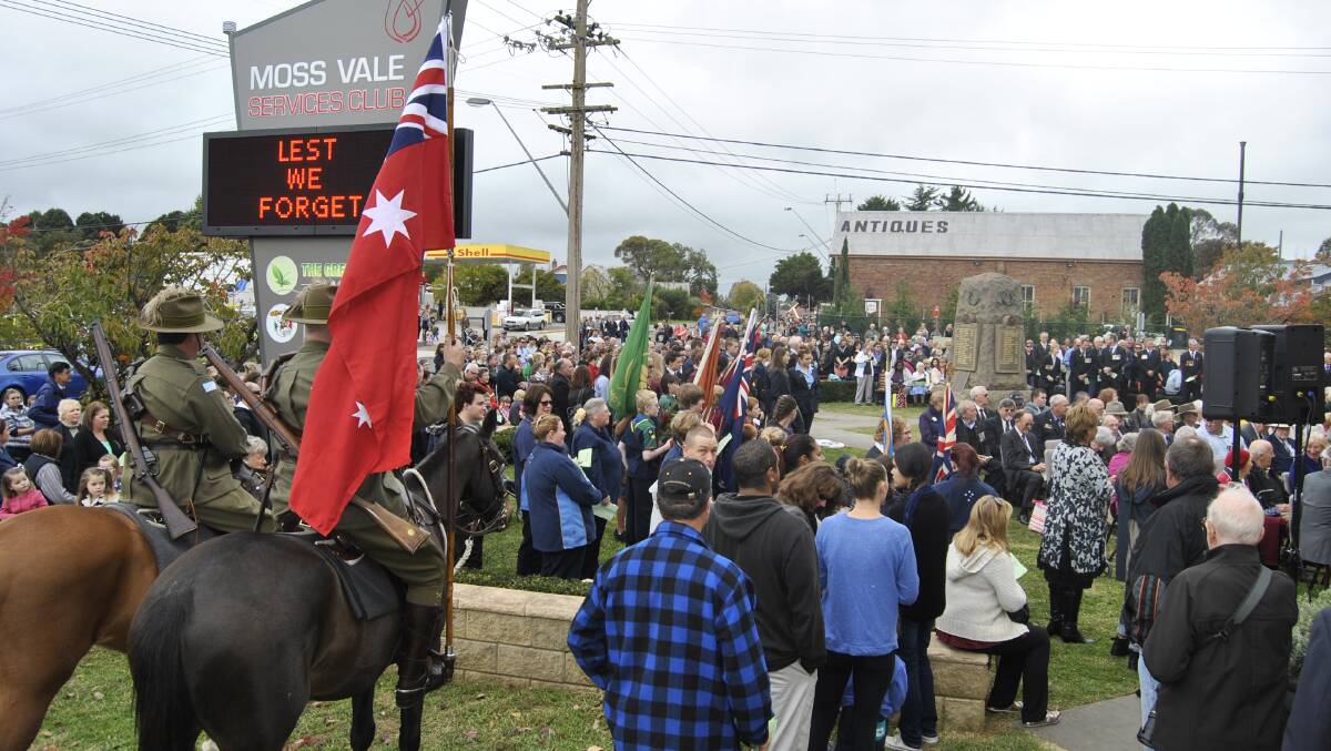Crowds gathered in front of Moss Vale Services Club for the ANZAC Day service. Photo by Dominica Sanda