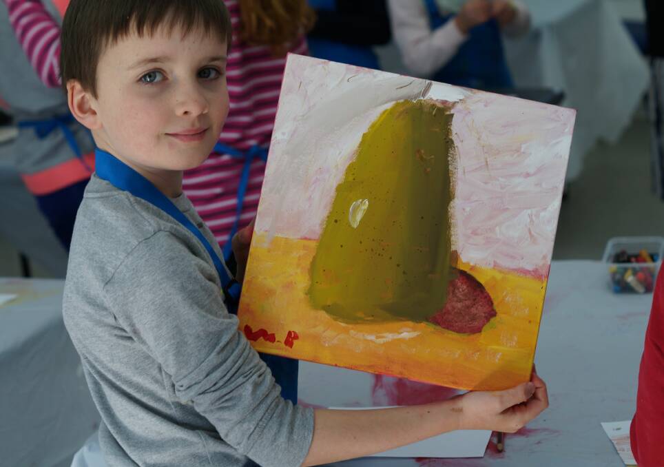 Kids Art Quest participant Will Barnett shows off one of his pieces. Photos supplied