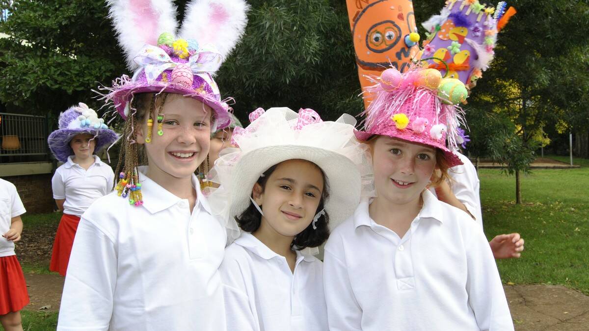 Lucy Nash, Eleni Khouchaba and Tasman Hawke with their Easter hats. Photo by Emma Biscoe