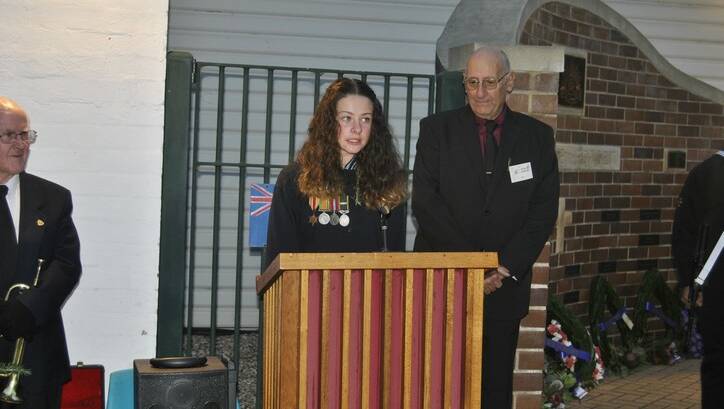 Abbie Zwicki from Hill Top Public School speaking at the Hill Top dawn service. Photo by Dominica 