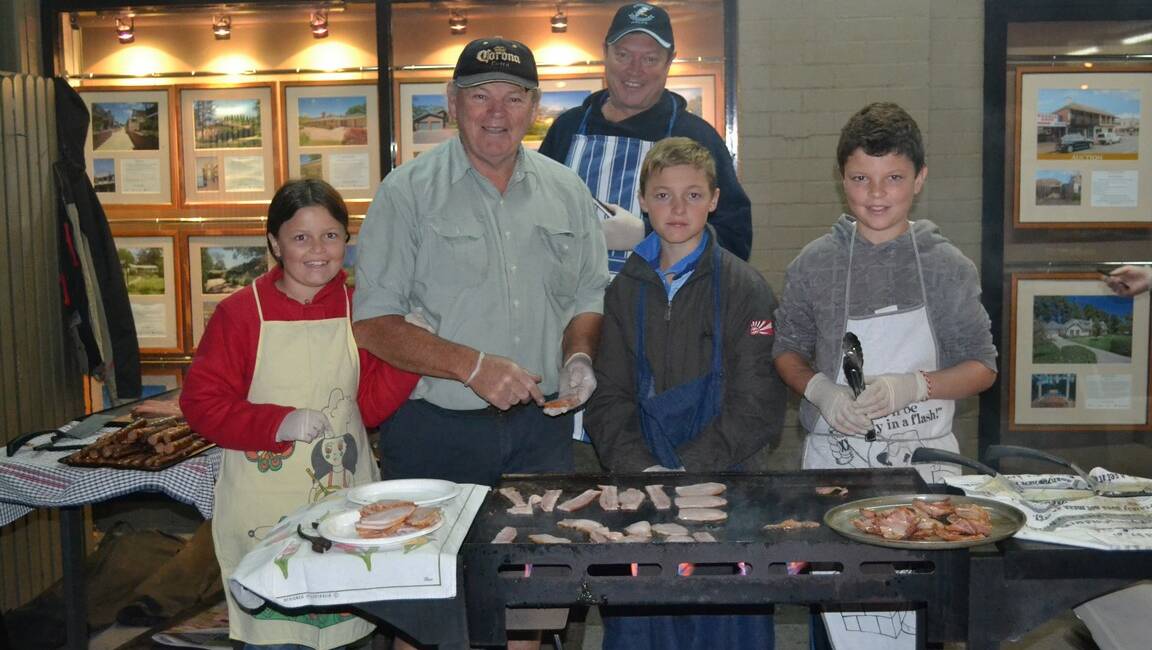 Cooking up a hearty breakfast for the hungry hoards at the Bowral Dawn Service are Sarah Morton, 10, Mick Hyland, Scott Morton, Ryan Morton, 12, Janie Morton, 12.