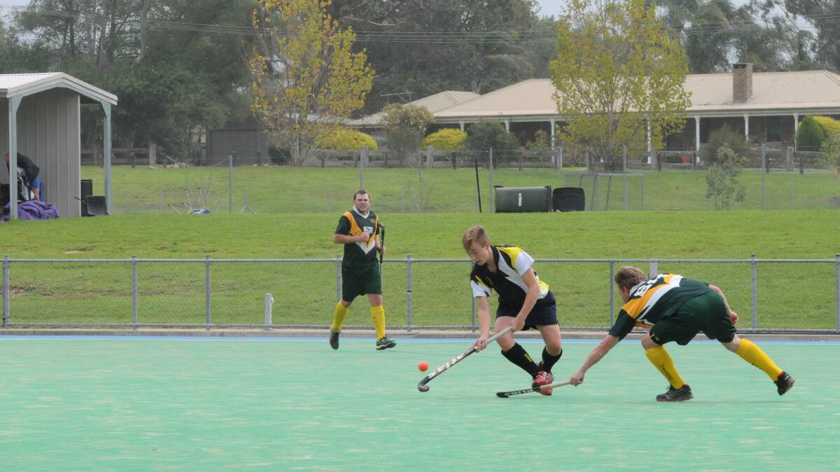 Higginson Blaik does his best to control the ball during the Mittagong versus Robertson game. Photo by Lauren Strode