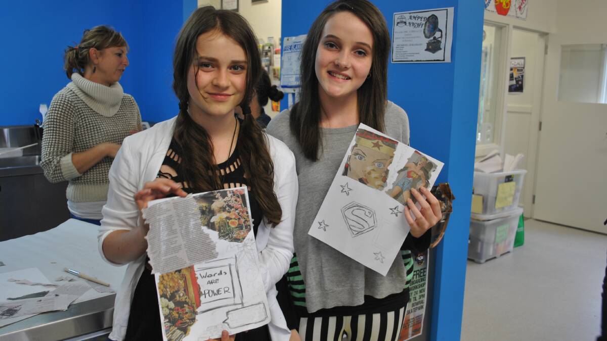 Imogen Boyd (13) and Victoria Weber (14) show off their artworks. Photo by Dominica Sanda