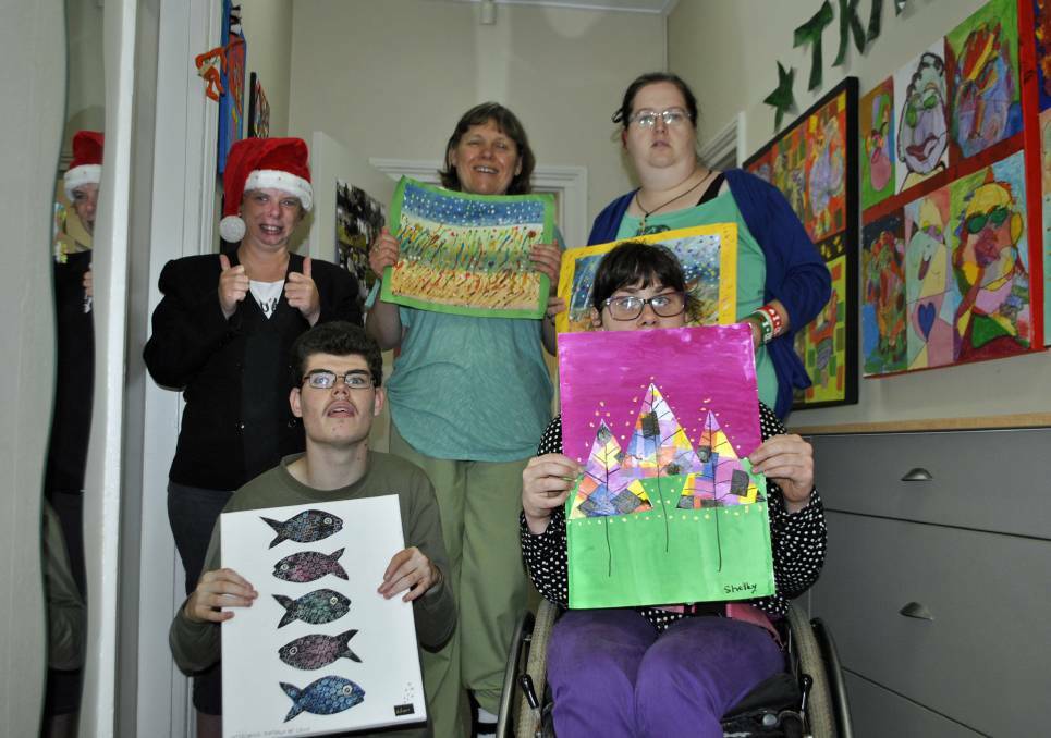 Interchange residents Sarah, Stella, Amy, Adam and Shelley show off their artworks for the 2015 Creative Creations exhibition. Photo by Emily Bennett