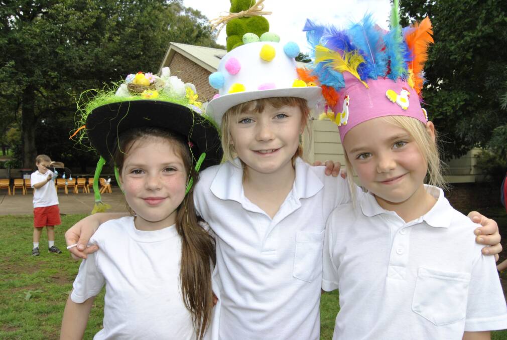 Halle Quinn, Olivia Deleuuw and Emily Quigley in their Easter hats from Exeter Public School. Photo by Emma Biscoe