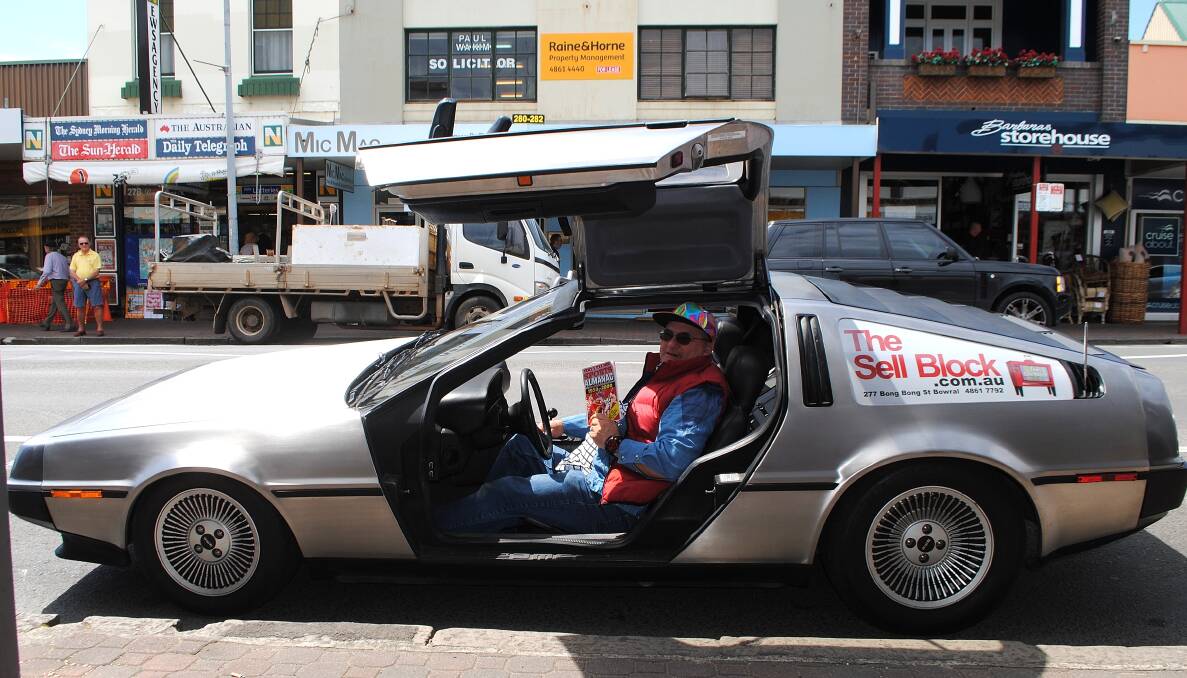 Sell Block co-owner Richard Alekna dressed as Marty McFly from the film 'Back to the Future' with his DeLorean DMC-12. Photo Ainsleigh Sheridan