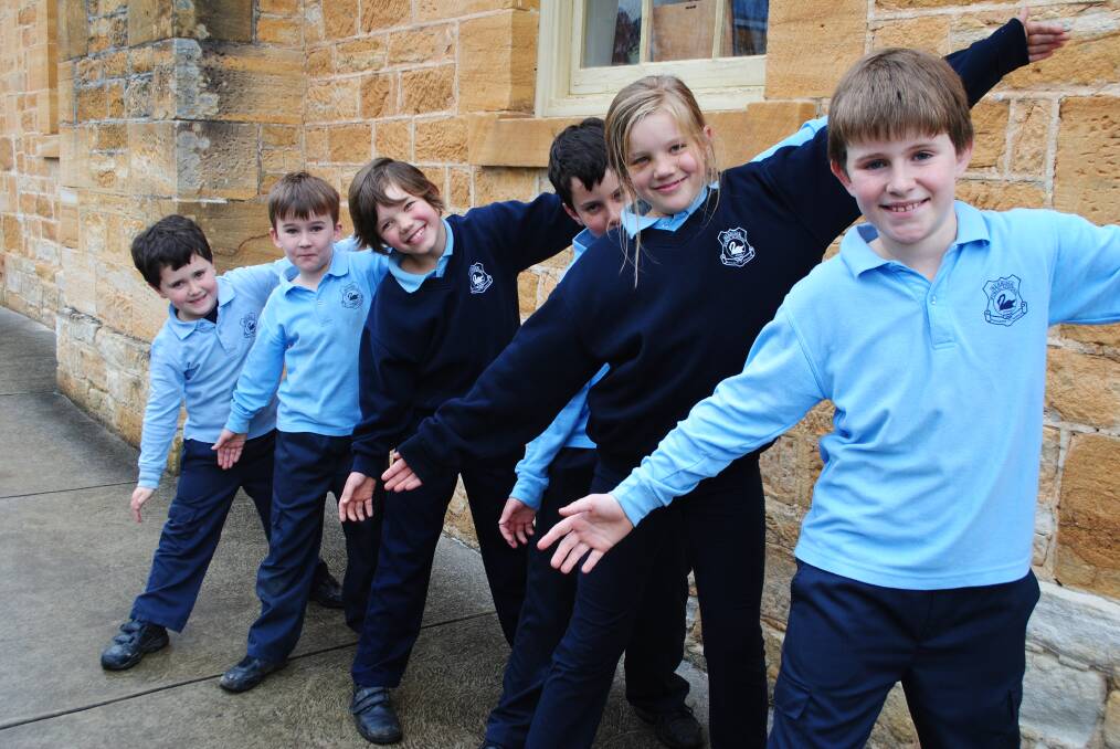Extend a hand and put your best foot forward to help primary school children walk safely to school this Friday, as shown by Berrima students Riley (Yr 1), Joshua (Yr 1), Caitlin (Yr 2), Tate (Yr 4), Georgia (Yr 4) and Ethan (Yr 4). 
Photo: Ainsleigh Sheridan
