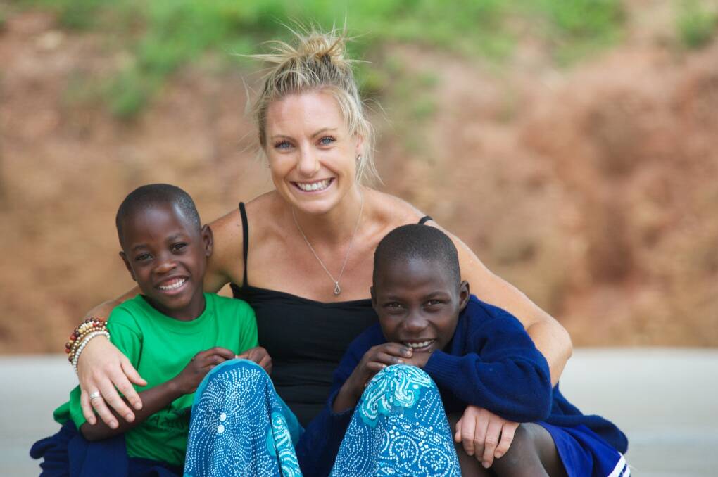 Annabelle Chauncy, pictured here with students at Katuuso School in Uganda. Photo: FDC